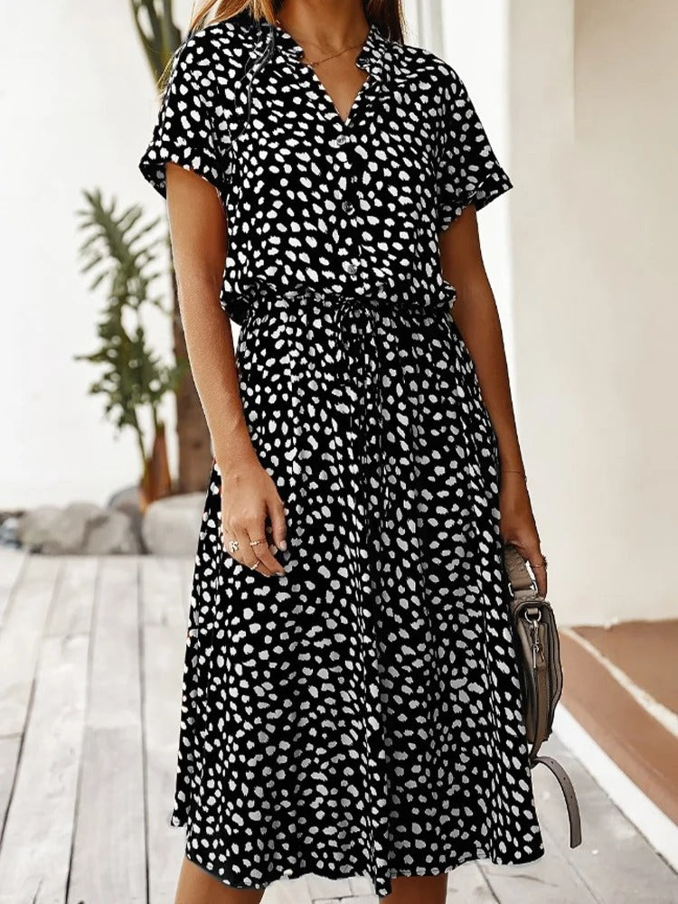 Robe chemise midi élégante et confortable. Coupe fluide, idéale pour toutes occasions.