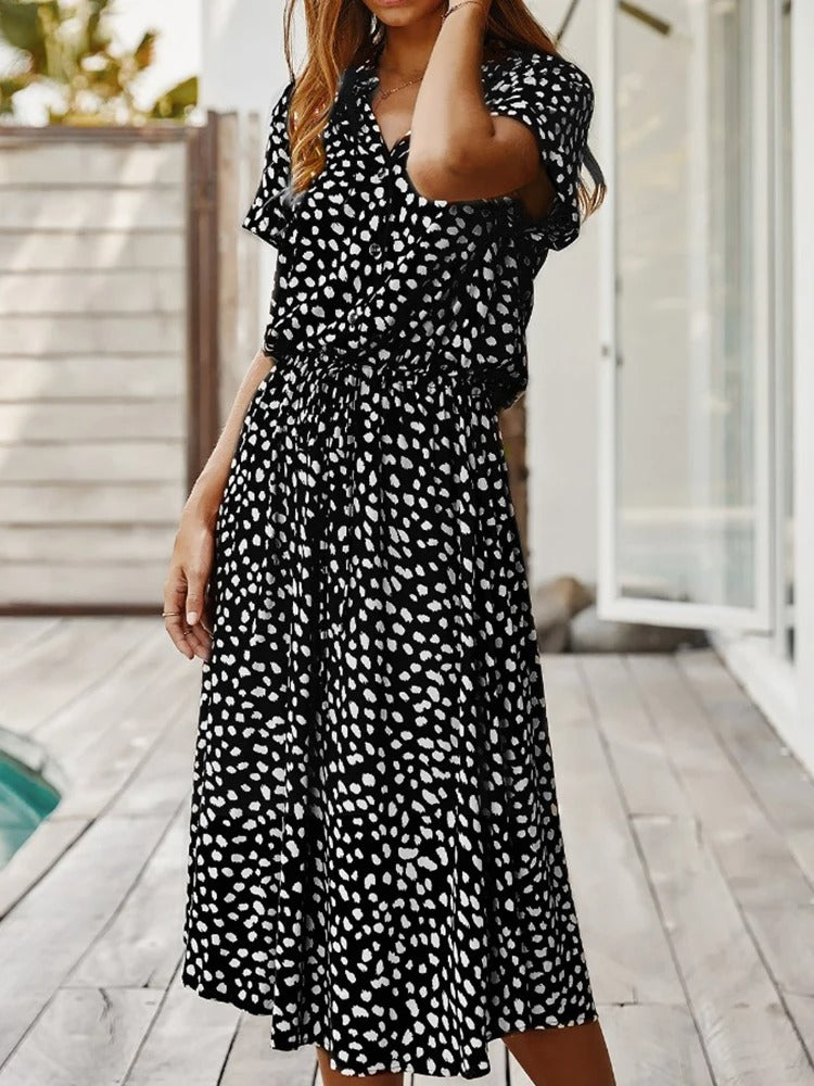 Robe chemise midi élégante et confortable. Coupe fluide, idéale pour toutes occasions.