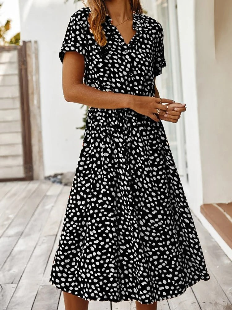 Robe chemise midi élégante et confortable. Coupe fluide, idéale pour toutes occasions.