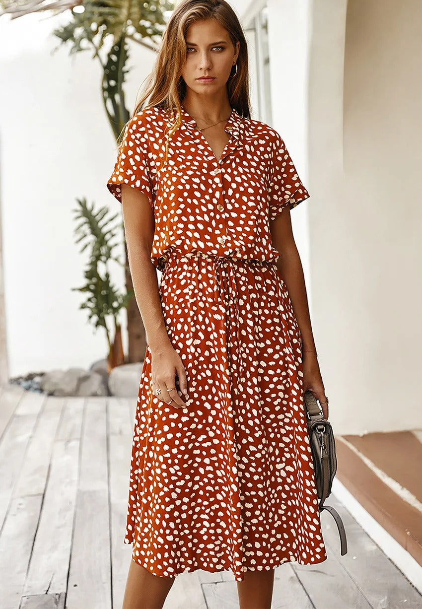 Robe chemise midi élégante et confortable. Coupe fluide, idéale pour toutes occasions.