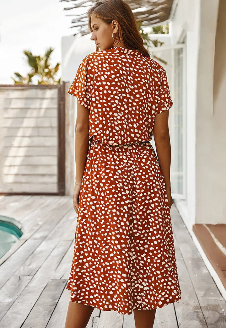 Robe chemise midi élégante et confortable. Coupe fluide, idéale pour toutes occasions.