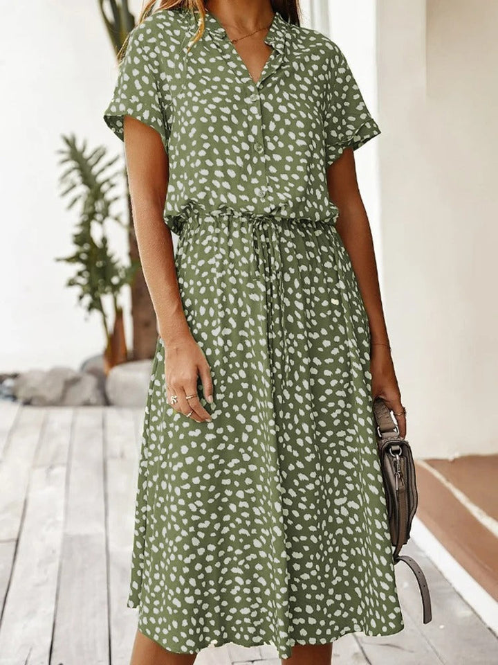 Robe chemise midi élégante et confortable. Coupe fluide, idéale pour toutes occasions.