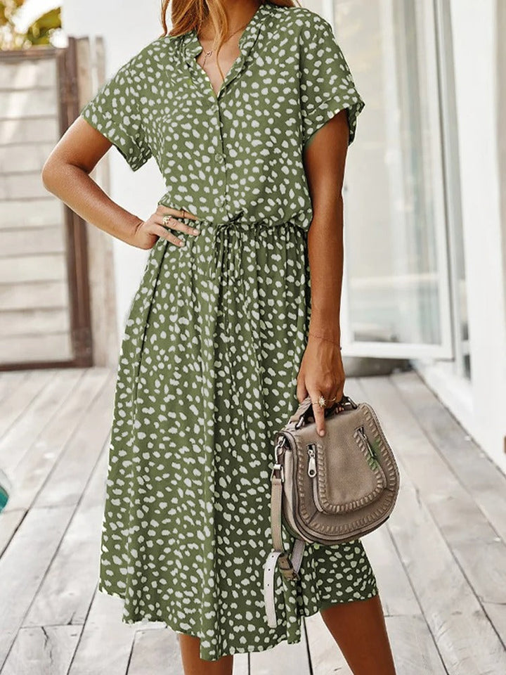 Robe chemise midi élégante et confortable. Coupe fluide, idéale pour toutes occasions.