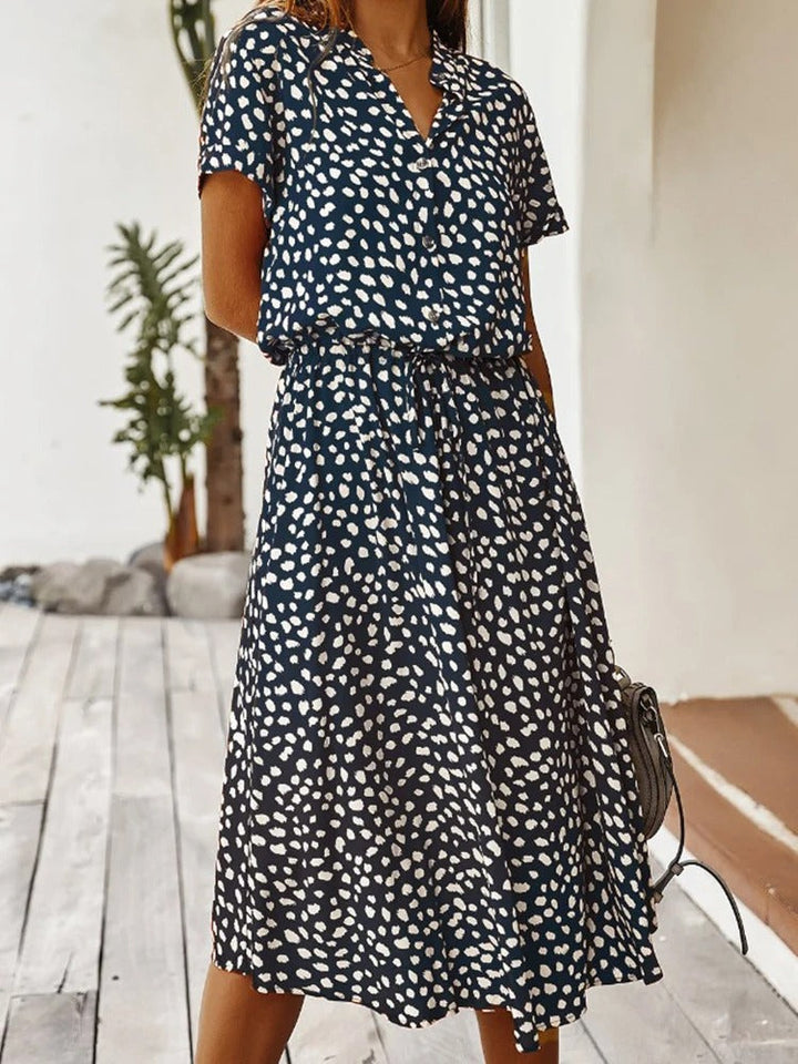 Robe chemise midi élégante et confortable. Coupe fluide, idéale pour toutes occasions.