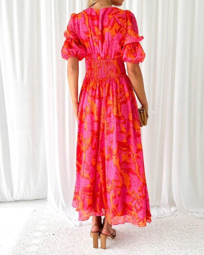 Magnifique robe femme rouge rosé classique, encolure en V et manches bouffantes. Style moderne et féminin.