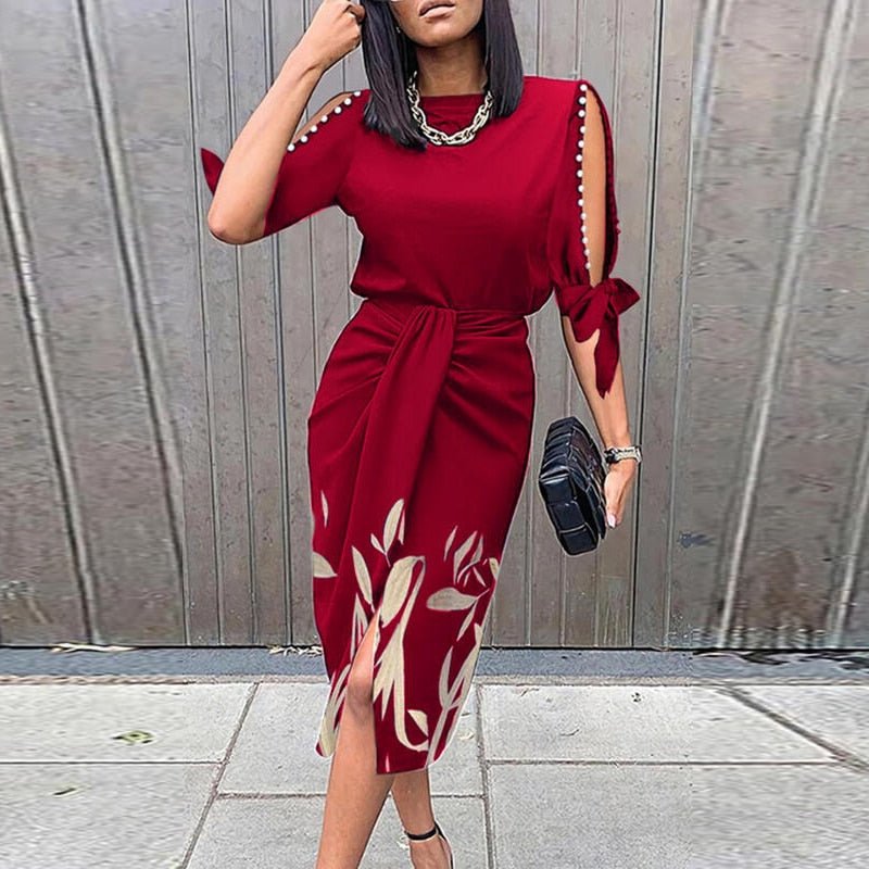 Robe de cocktail femme en tissu fluide, imprimé floral vibrant, idéale pour toute occasion.