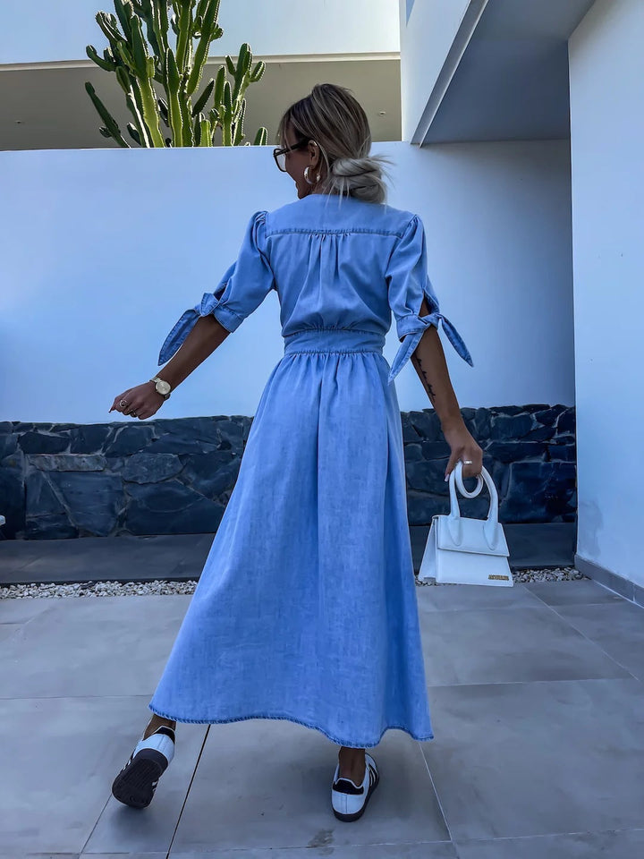Robe cocktail élégante pour femme, style moderne, parfaite pour événements chic et soirées printemps/été.