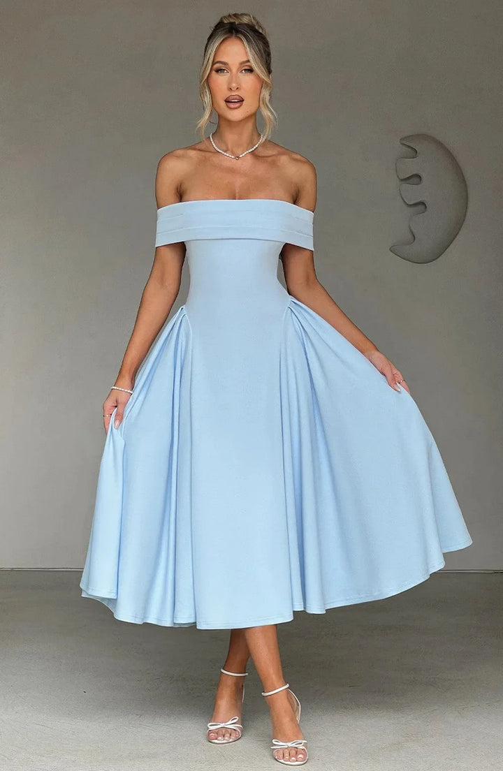 Robe cocktail midi femme chic et moderne, parfaite pour des soirées élégantes et mémorables.