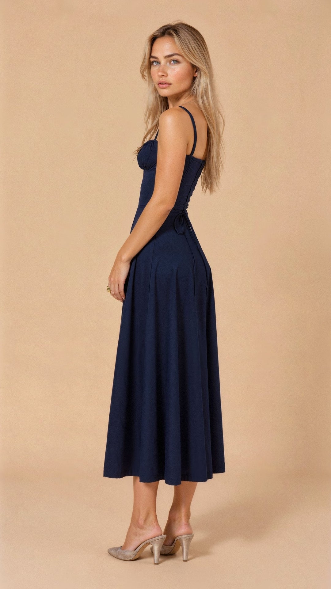 Robe corset midi Kiana élégante, jupe fluide, corsage structurant, féminité raffinée, tenue polyvalente chic pour femmes.