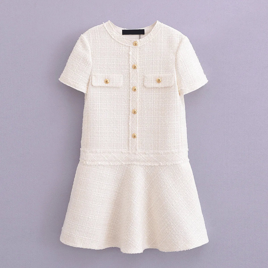 Robe courte été, col rond, texture élégante.  Coupe flatteuse et confortable.  Parfait pour l'été.