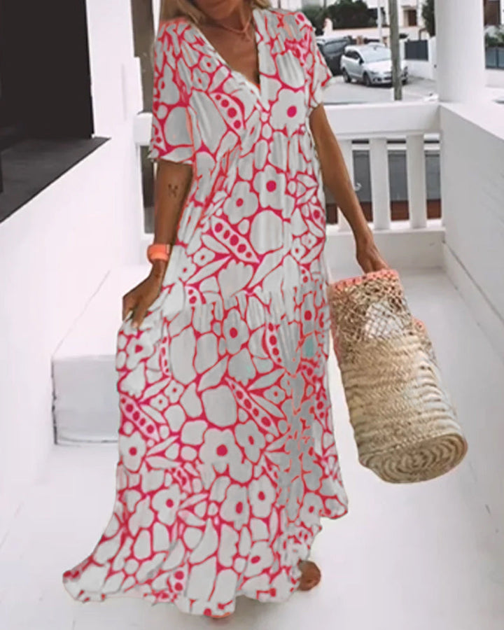Robe imprimée femme à col en V, un incontournable pour un look estival décontracté et chic. Tendance actuelle.