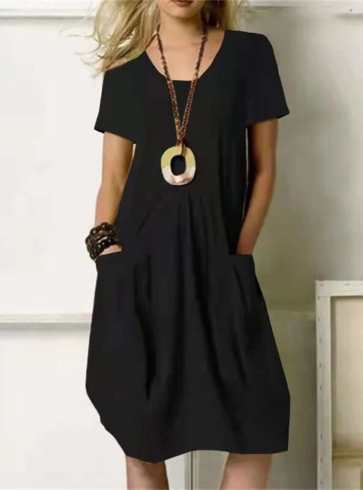 Tenue femme automnale, robe décontractée chic et moderne, parfaite pour un look élégant et quotidien.