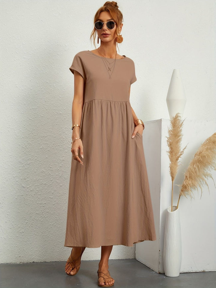 Robe fluide d'été pour femme, style décontracté. Essentiel mode printemps-été.