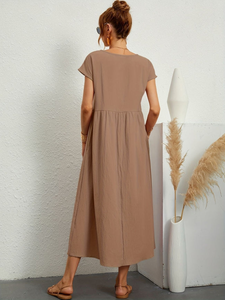 Robe femme estivale, coupe ample et confortable. Idéale pour les vacances d'été.