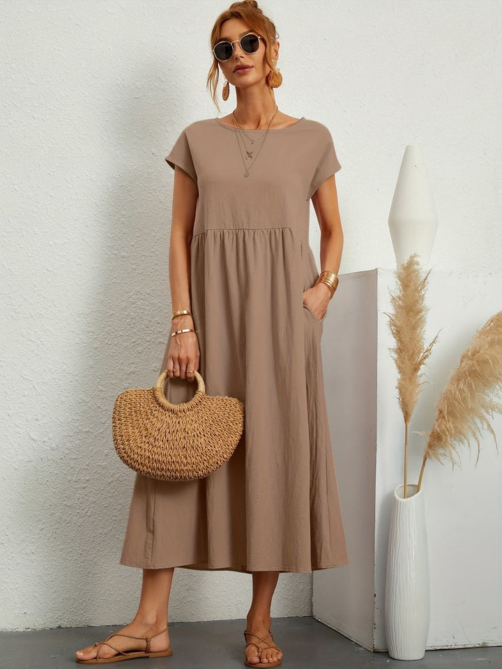 Robe femme confortable et chic. Parfaite pour les journées d'été décontractées.