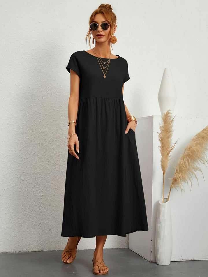 Tenue quotidienne femme: robe d'été confortable, col rond. Style moderne et polyvalent.