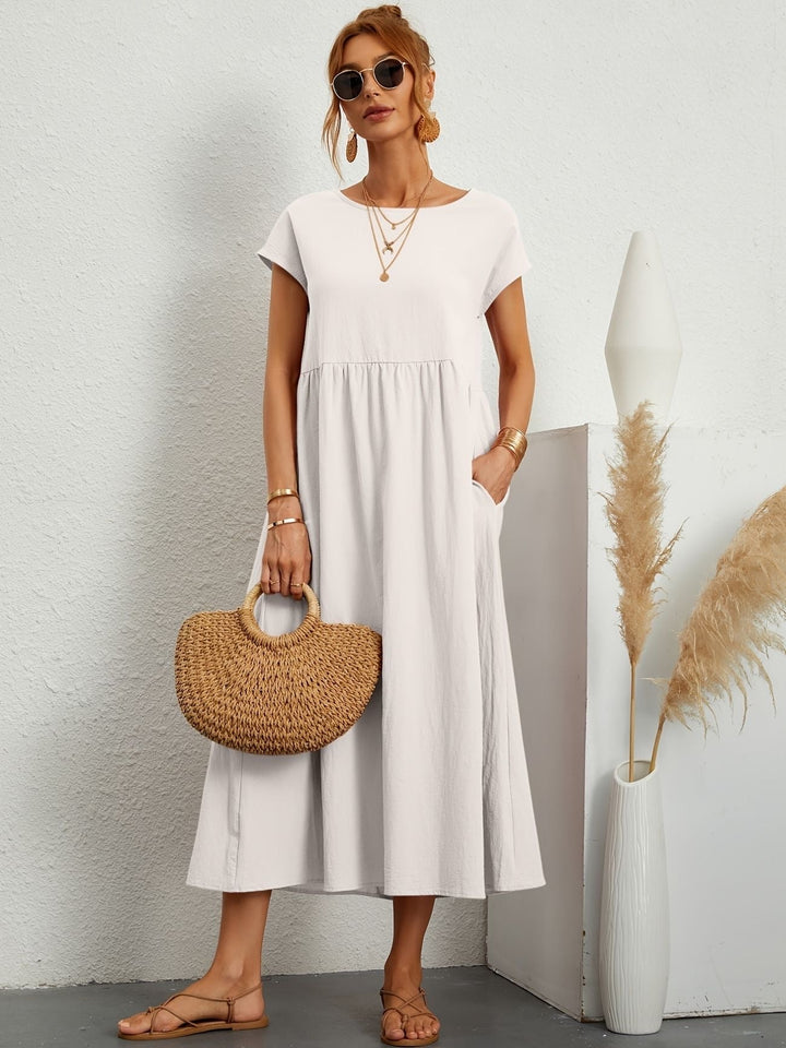 Robe femme décontractée pour le printemps-été. Style chic et facile à porter.