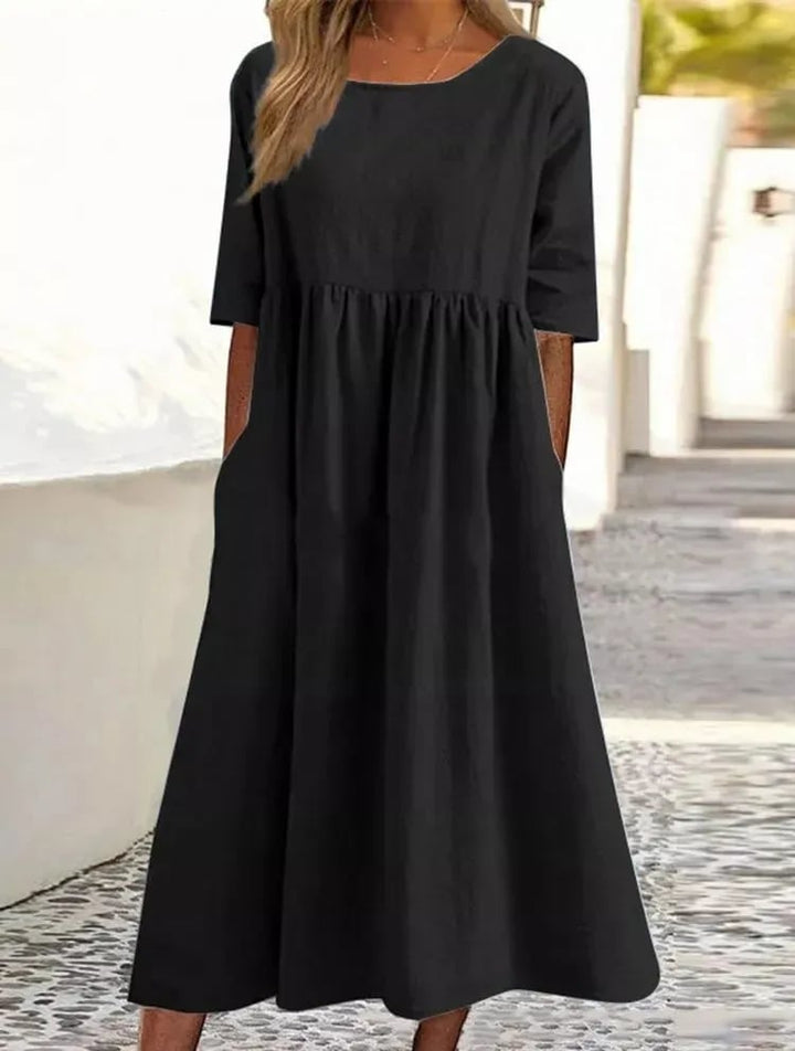 Robe d'été femme Ivanna, décontractée et tendance, idéale pour la mode féminine estivale.