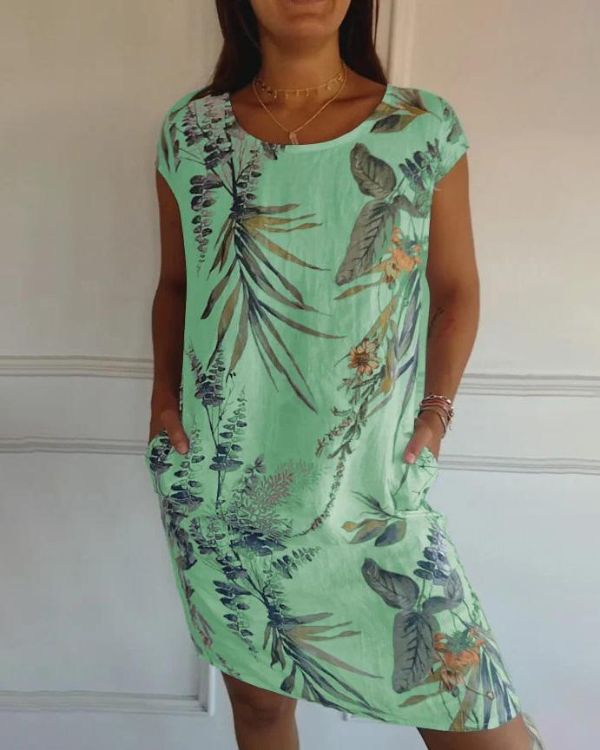 Modèle de robe femme été sans manches, style midi, légère et fluide, idéale pour le confort printanier.