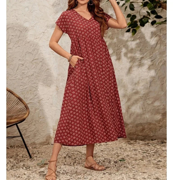 Robe d'été femme élégante coupe vintage à col V. Idéale pour un look chic et décontracté en mode féminine.