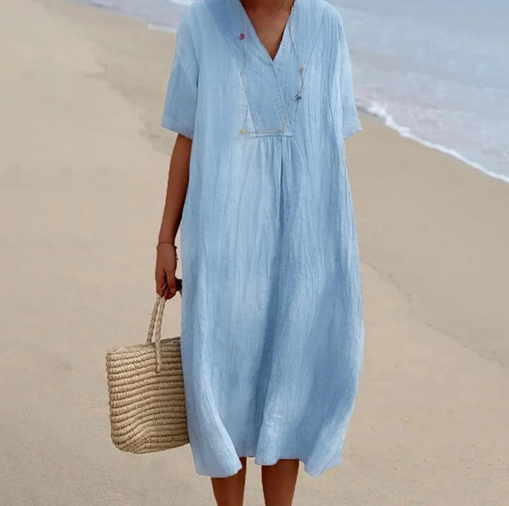 Robe d'été femme, style casual élégant. Idéale pour le quotidien, confortable et chic en toutes occasions.