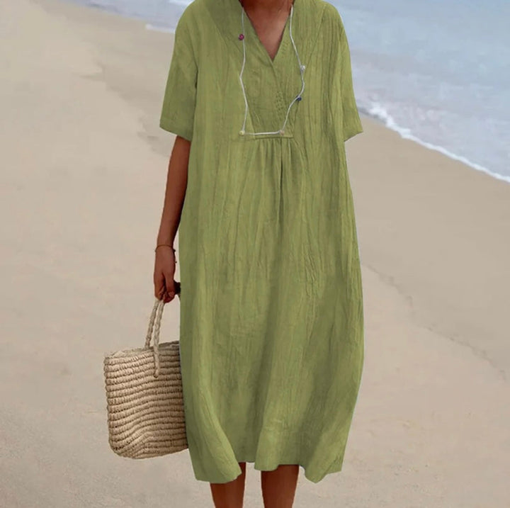 Robe élégante femme, idéale pour l'été. Confortable et tendance, parfaite pour une tenue casual chic.