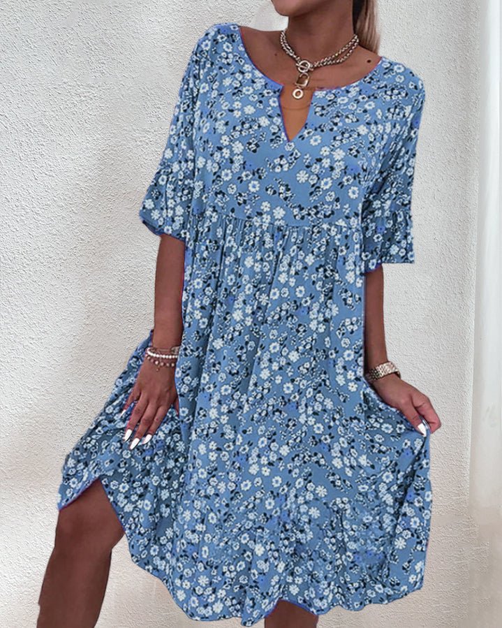 Superbe robe d'été à motif floral pour femme, féminine et fluide, idéale pour un confort élégant en saison chaude.