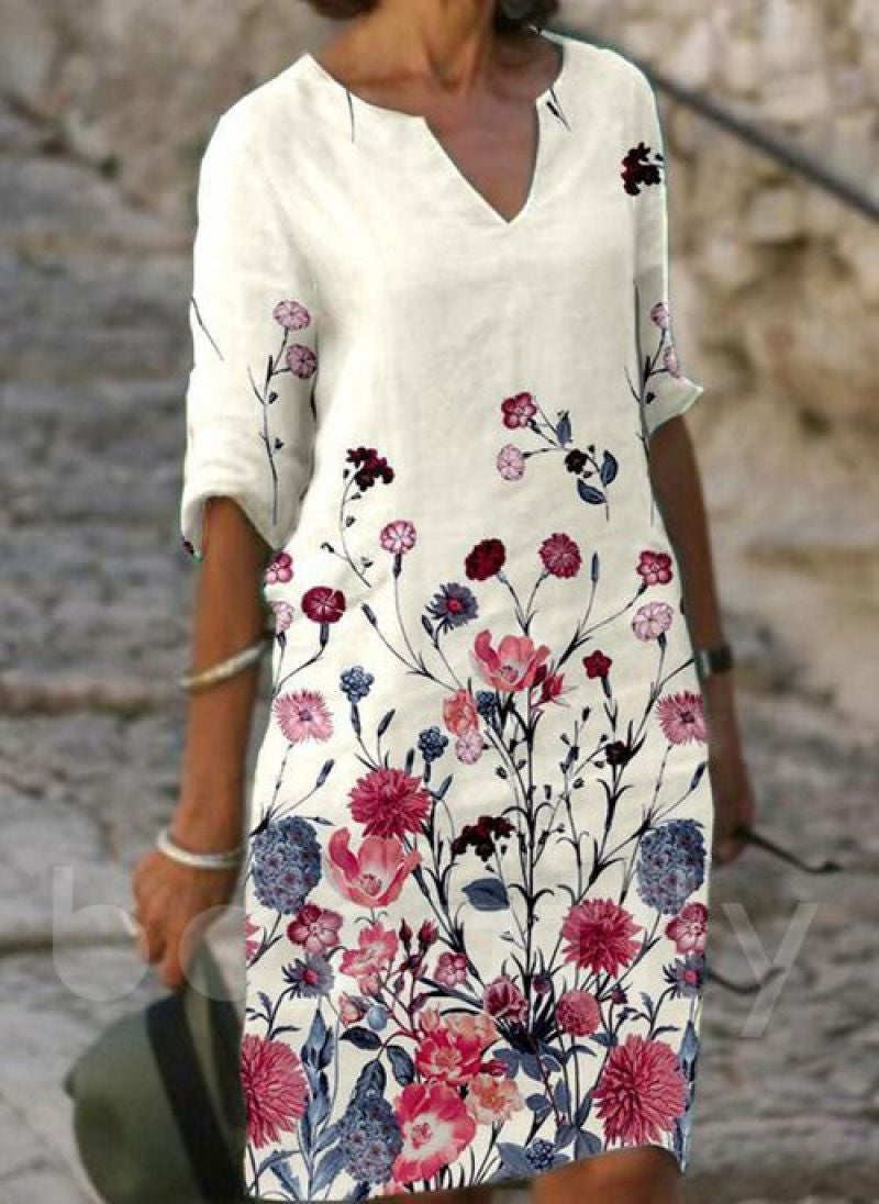 Robe d'été élégante femme, coupe chic et moderne, parfaite pour les journées ensoleillées. Tendance et confortable.