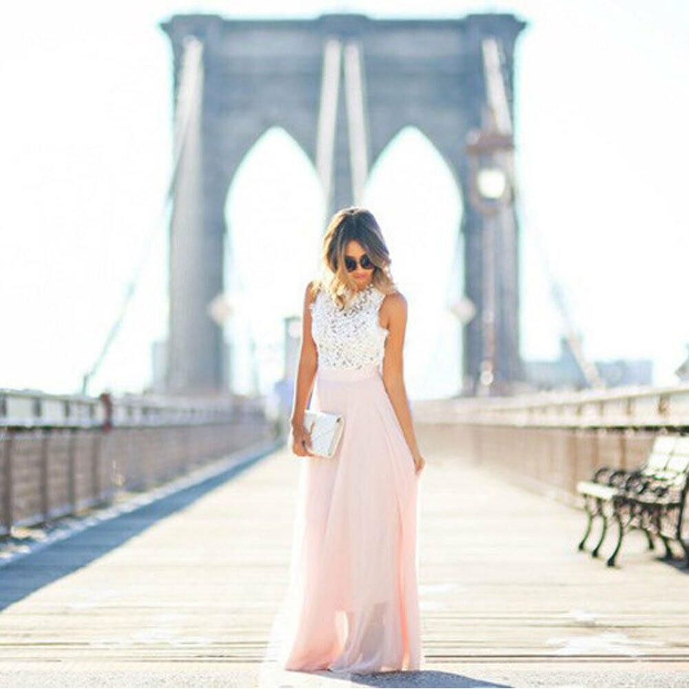 Robe maxi chic rose pour femme, design élégant et évasé, offrant confort et style estival moderne.