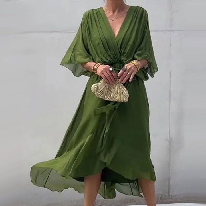 Tenue estivale: robe femme fluide nouée, midi, très confortable et tendance.