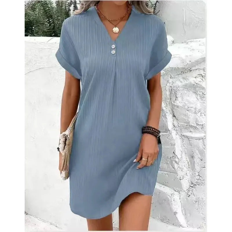 Élégante robe d'été midi pour femme, polyvalente et respirante, parfaite pour un look estival.