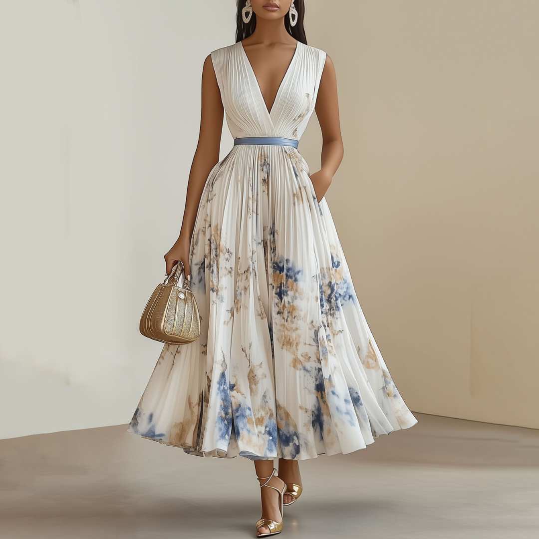 Robe de cérémonie fleurie élégante femme, coupe maxi fluide sans manches, idéale pour mariage, cocktail, soirée d'été chic.