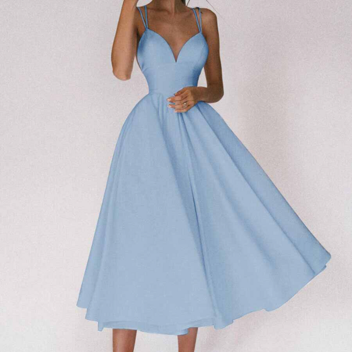 Robe de soirée chic femme, coupe élégante, décolleté en V et bretelles fines, parfaite pour cérémonie ou événement.