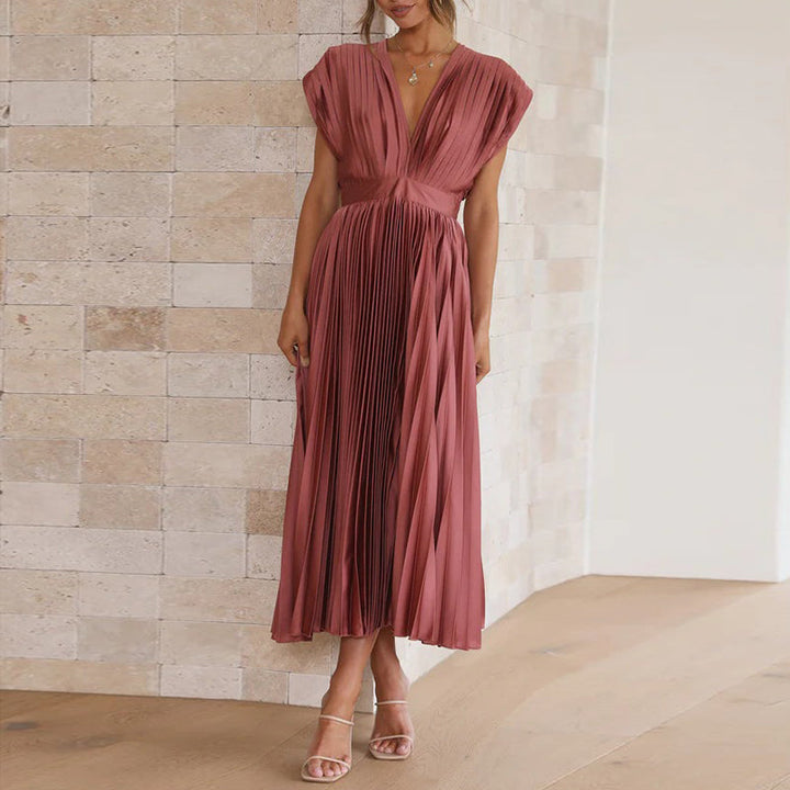 Robe de cocktail élégante pour femme, col en V, parfaite pour soirées et occasions spéciales. Chic et stylée.