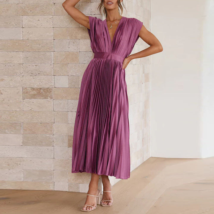 Tenue de soirée femme, robe polyvalente à col en V, idéale pour un look chic et moderne. Mode femme élégante.