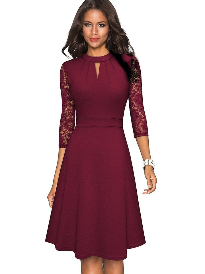 Robe de cocktail élégante pour femme, design évidé sophistiqué, idéale pour soirée habillée.