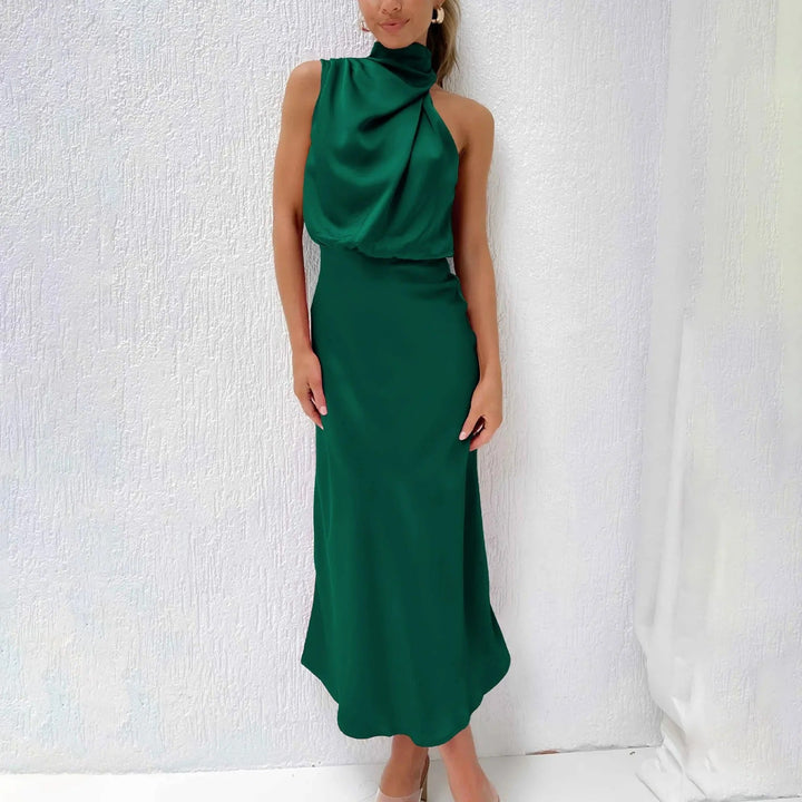 Robe élégante femme, couleur vive, pour soirée, cocktail ou événement. Tissu de qualité, design attrayant.