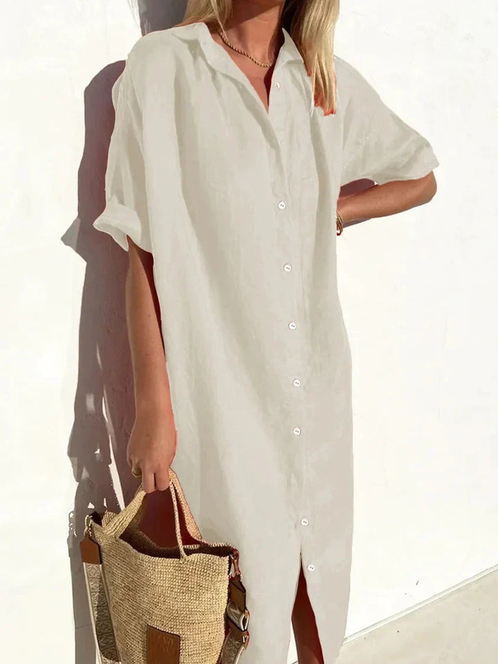 "Robe décontractée élégante en coton et lin, manches amples avec boutons, texture légère pour été, style féminin."