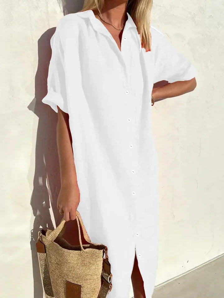 "Robe décontractée élégante en coton et lin, manches amples avec boutons, texture légère pour été, style féminin."