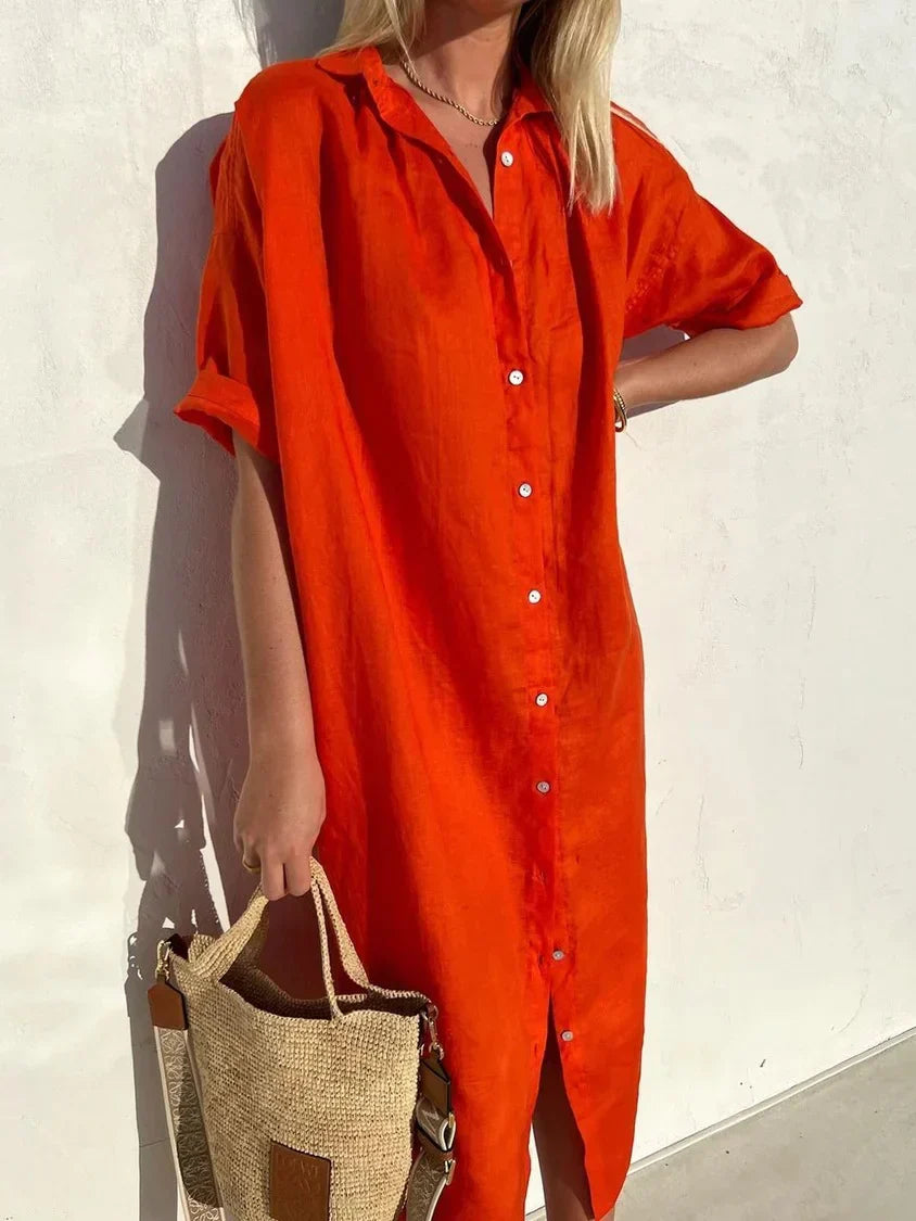 "Robe décontractée élégante en coton et lin, manches amples avec boutons, texture légère pour été, style féminin."