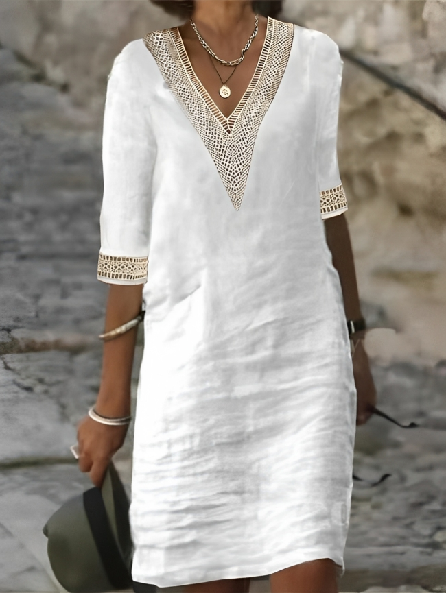 Robe d'été crochet, style fluide et léger.  Détail crochet raffiné. Parfaite pour l'été.