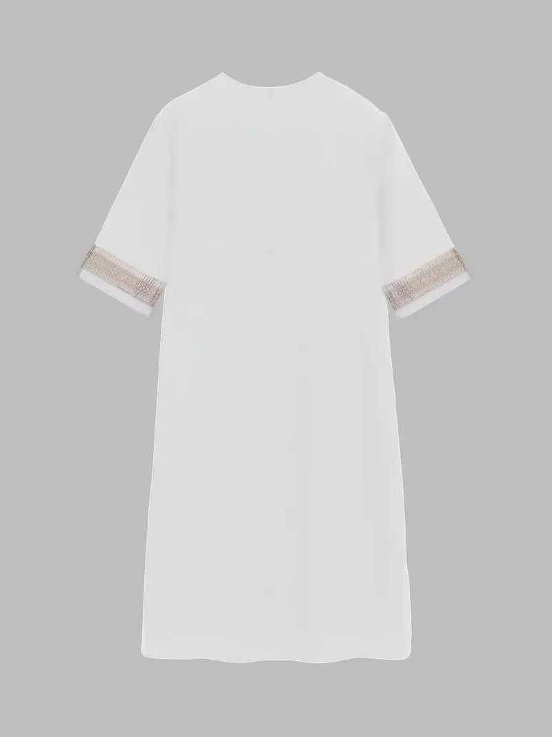 Robe d'été crochet, style fluide et léger.  Détail crochet raffiné. Parfaite pour l'été.