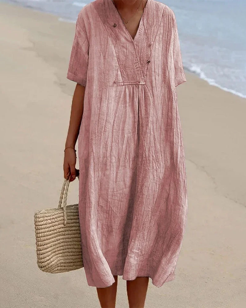 "Robe d'été élégante fluide pour femme, tissu léger en coton et lin, style féminin, coupe ajustée et jupe évasée."