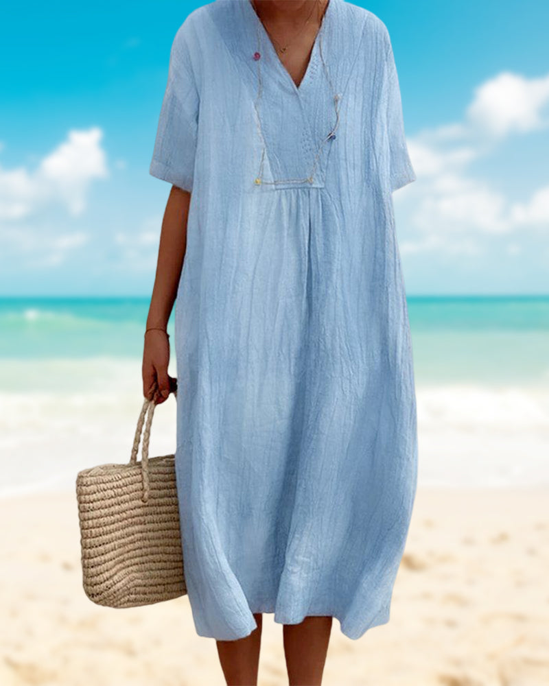 "Robe d'été élégante fluide pour femme, tissu léger en coton et lin, style féminin, coupe ajustée et jupe évasée."