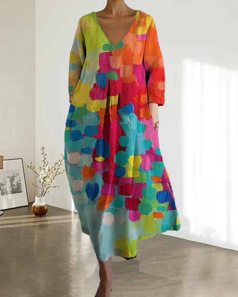 "Robe d'été femme en lin léger avec imprimé coloré, coupe flatteuse, idéale pour les journées chaudes et occasions estivales.