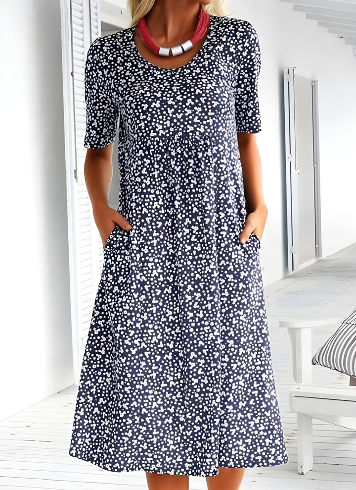 Robe d'été femme, tissu léger coloré, motifs élégants, idéal été. Robe moderne et confortable pour chaque occasion.