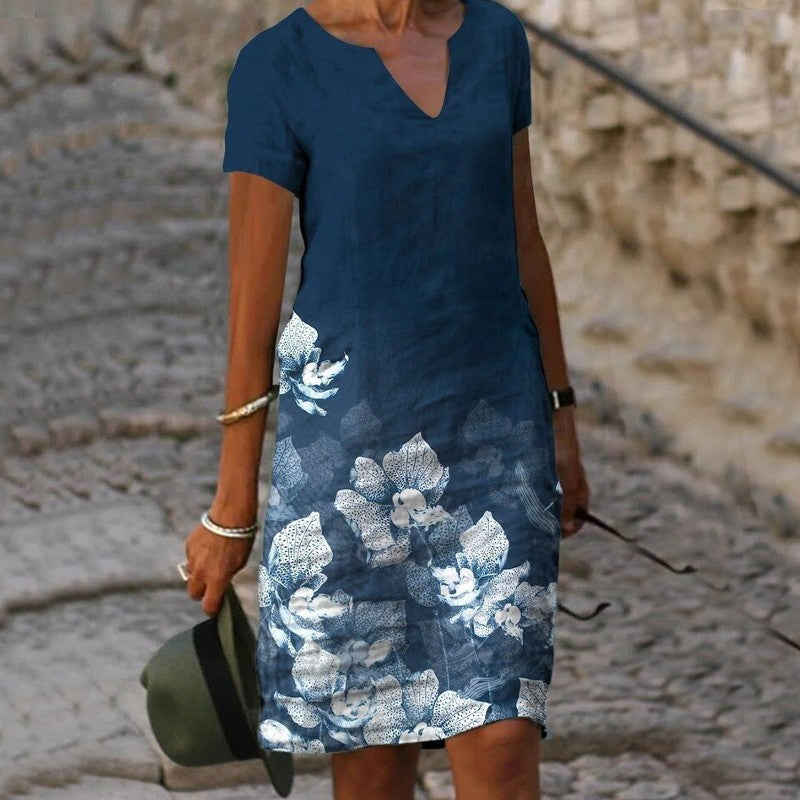 "Robe d'été fleurie Isabelle, légère et élégante, vue de face, avec coupe fluide et imprimé floral chic pour l'été."