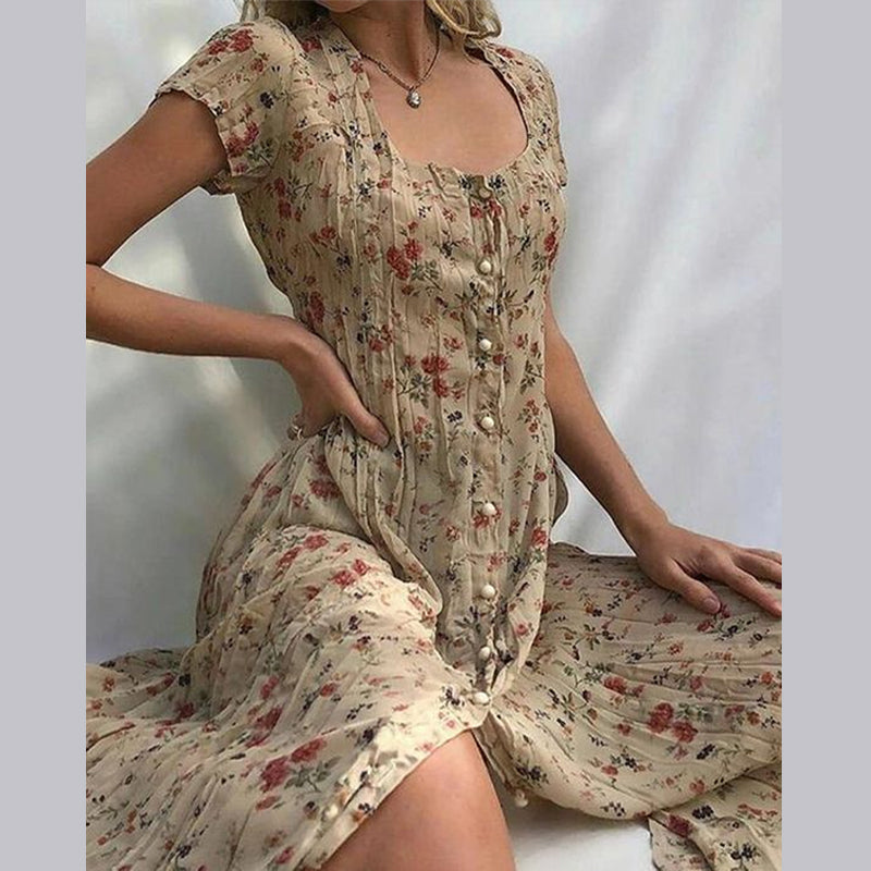 Robe d'été fleurie, légère et élégante.  Imprimé floral, coupe flatteuse.  Parfait pour l'été.