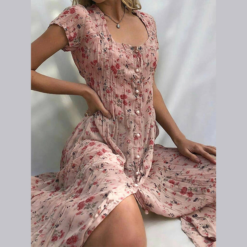 Robe d'été fleurie, légère et élégante.  Imprimé floral, coupe flatteuse.  Parfait pour l'été.