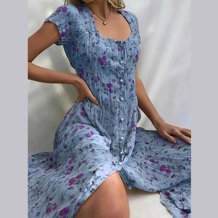 Robe d'été fleurie, légère et élégante.  Imprimé floral, coupe flatteuse.  Parfait pour l'été.